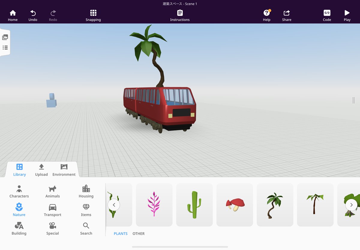 タブレットの3Dモデリングアプリで乗りものを組み立てている画面